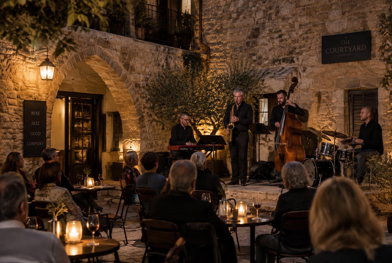 Live jazz quartet performing in a stone courtyard in Paphos old town, Cyprus